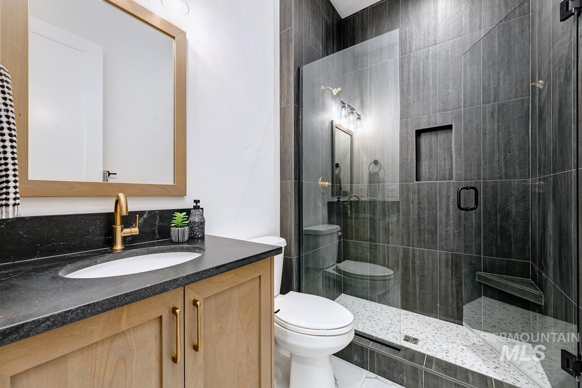 13339 North Hazel Grouse Way Boise, ID 83714 - Photo 24 of 50 Full bath featuring a stall shower and vanity