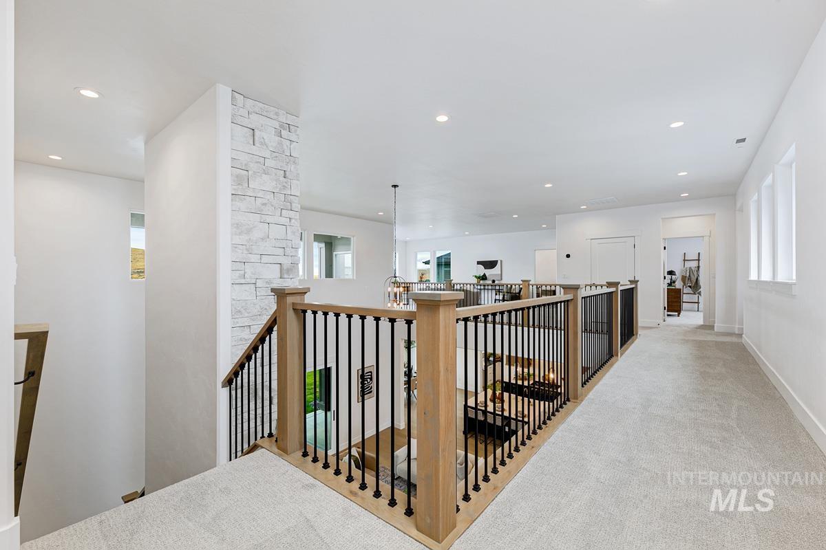 13339 North Hazel Grouse Way Boise, ID 83714 - Photo 25 of 50 Hallway featuring an upstairs landing, carpet floors, and recessed lighting