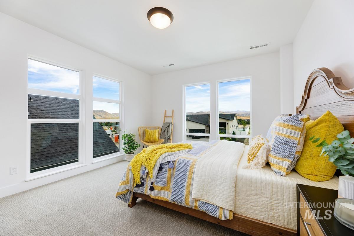 13339 North Hazel Grouse Way Boise, ID 83714 - Photo 27 of 50 Bedroom featuring carpet flooring