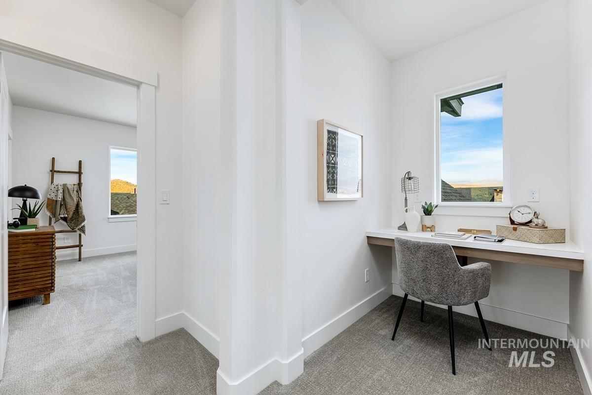 13339 North Hazel Grouse Way Boise, ID 83714 - Photo 31 of 50 Office featuring light carpet and built in desk