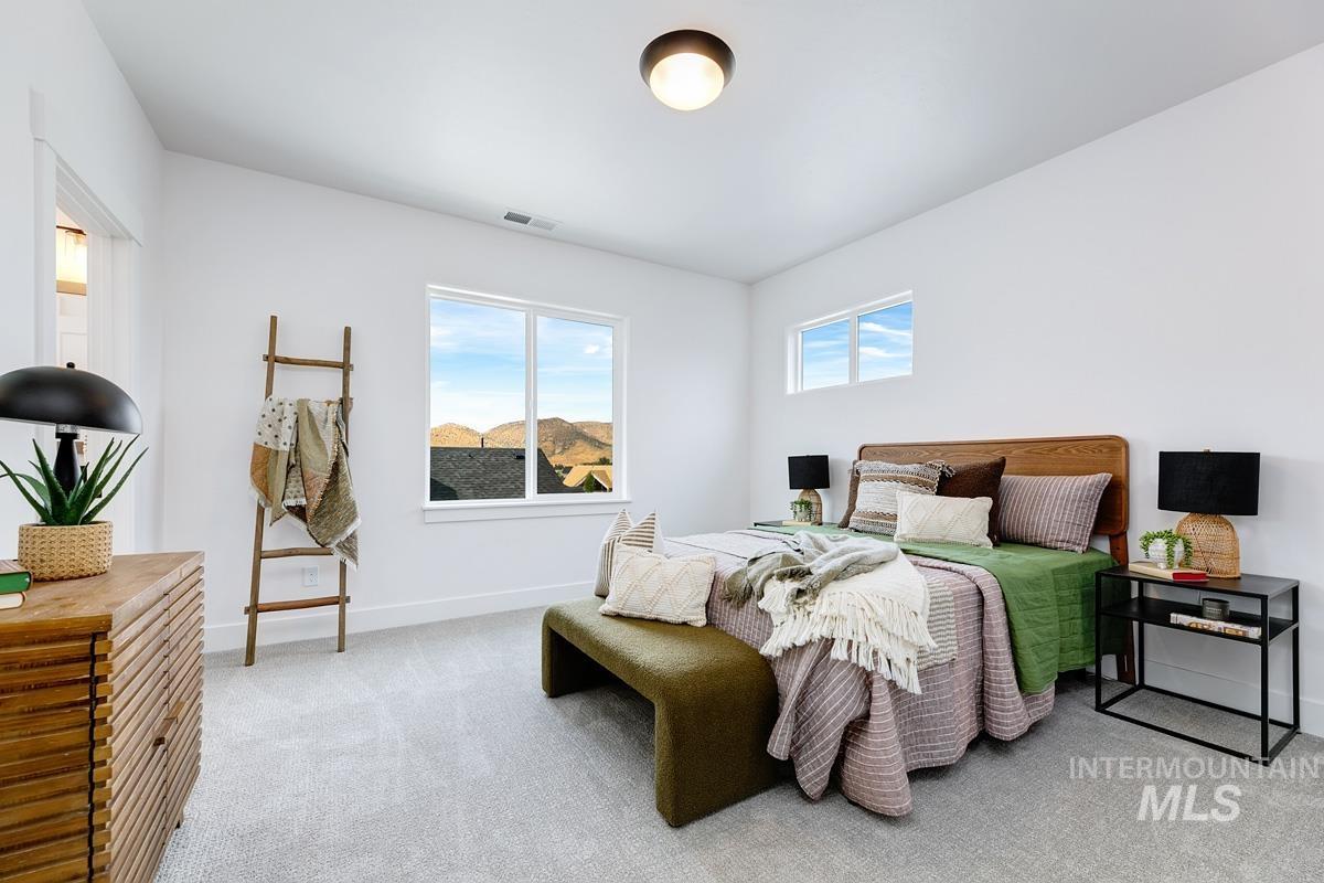 13339 North Hazel Grouse Way Boise, ID 83714 - Photo 32 of 50 Bedroom featuring carpet and baseboards