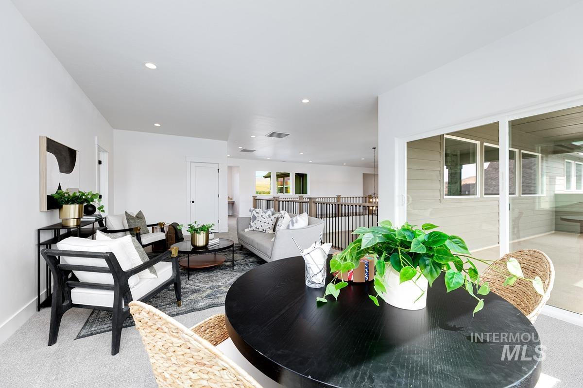 13339 North Hazel Grouse Way Boise, ID 83714 - Photo 36 of 50 Living room featuring light colored carpet and recessed lighting