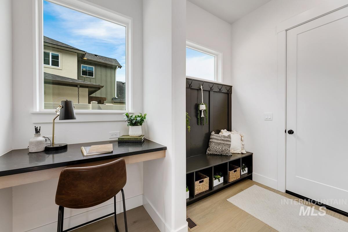 13339 North Hazel Grouse Way Boise, ID 83714 - Photo 38 of 50 Home office featuring built in study area and light wood-style flooring