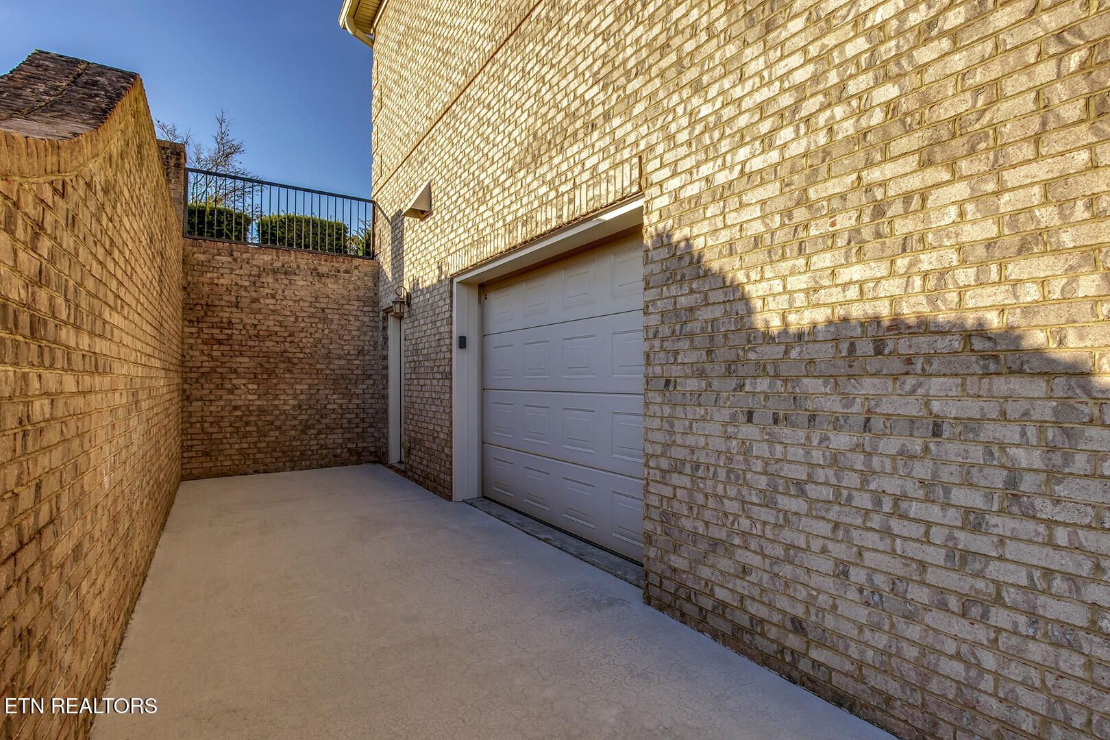 1490 Rarity Bay Parkway Vonore, TN 37885 - Photo 51 of 60 51_RarityBayPkwy_1490_LowerGarageEntry