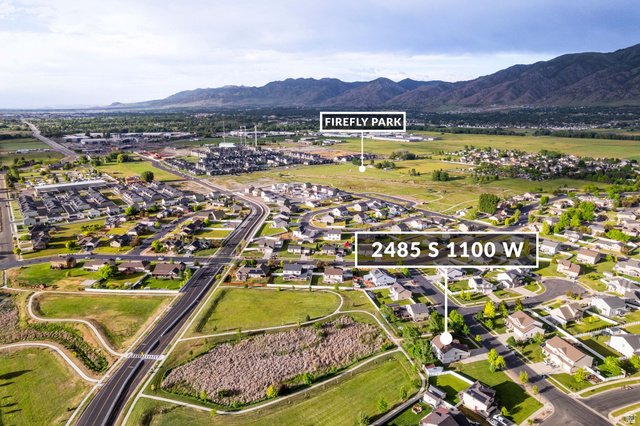 2485 South 1100th Street West Logan, UT 84321 - Photo 51 of 53 Aerial perspective showcasing a residential neighborhood with distant mountain ranges