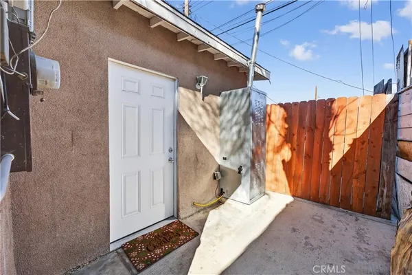 a view of a house with a street