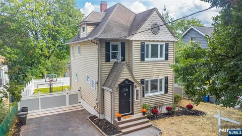 a front view of a house with balcony
