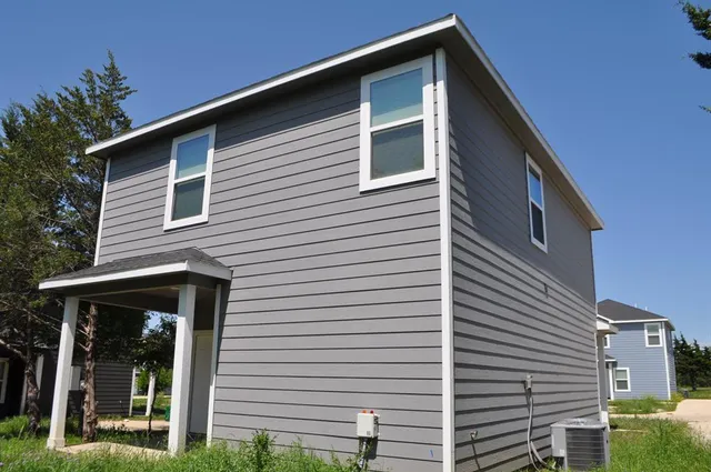 a front view of a house with porch