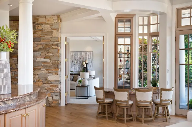 a kitchen that has a sink and a window in it
