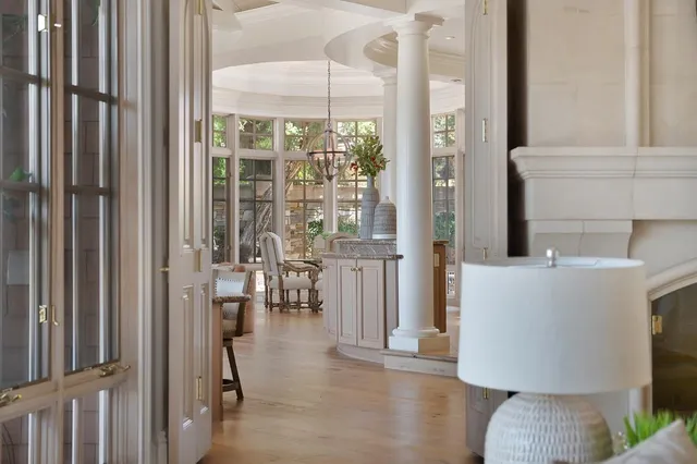 a bathroom with a sink vanity mirror and toilet