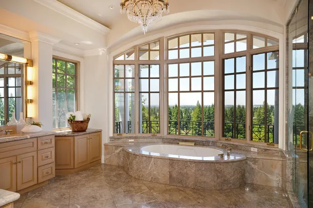 a living room with furniture and fireplace