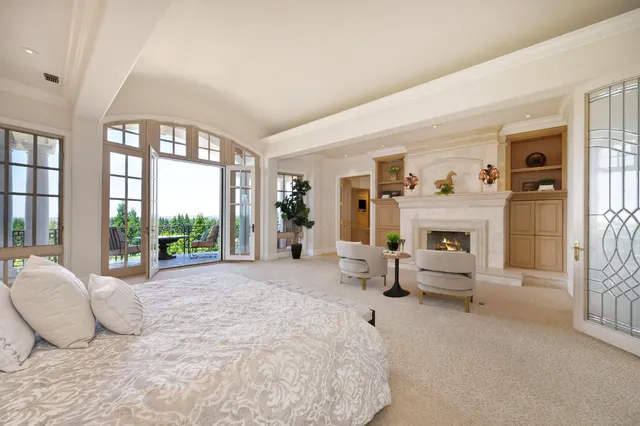 a kitchen with a table chairs stove and microwave