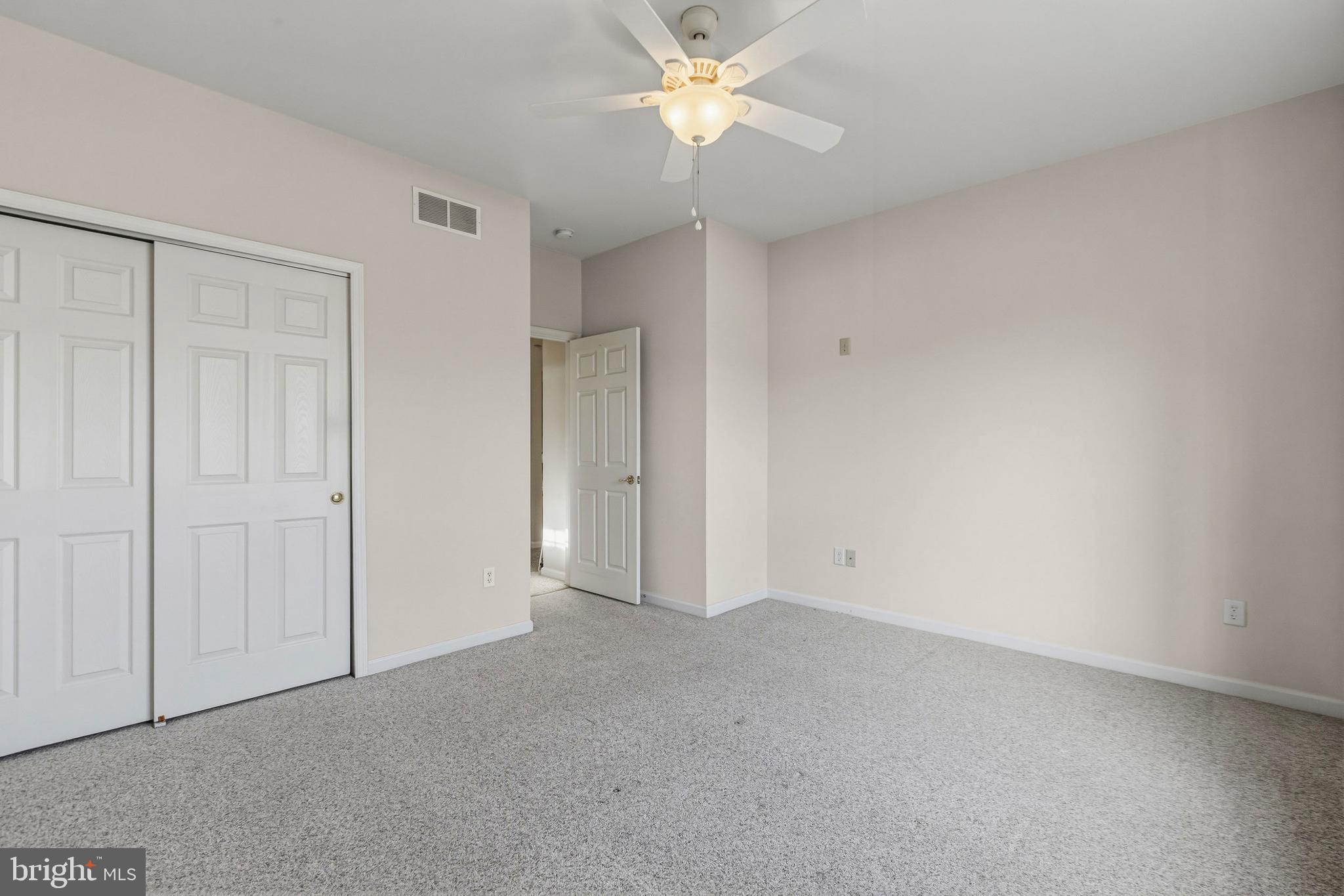 88 Springmill Drive Middletown, DE 19709 - Photo 17 of 63 a view of an empty room and a ceiling fan