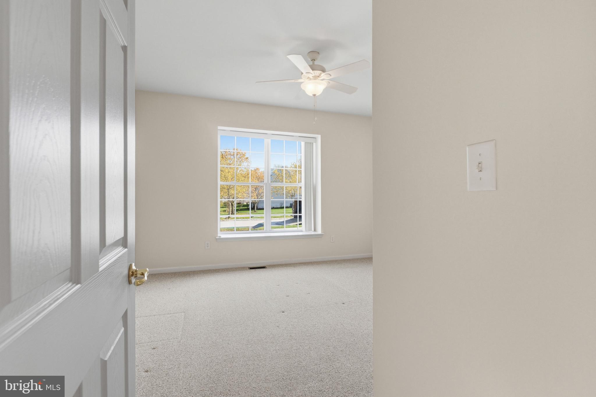 88 Springmill Drive Middletown, DE 19709 - Photo 19 of 63 a view of an empty room with a window