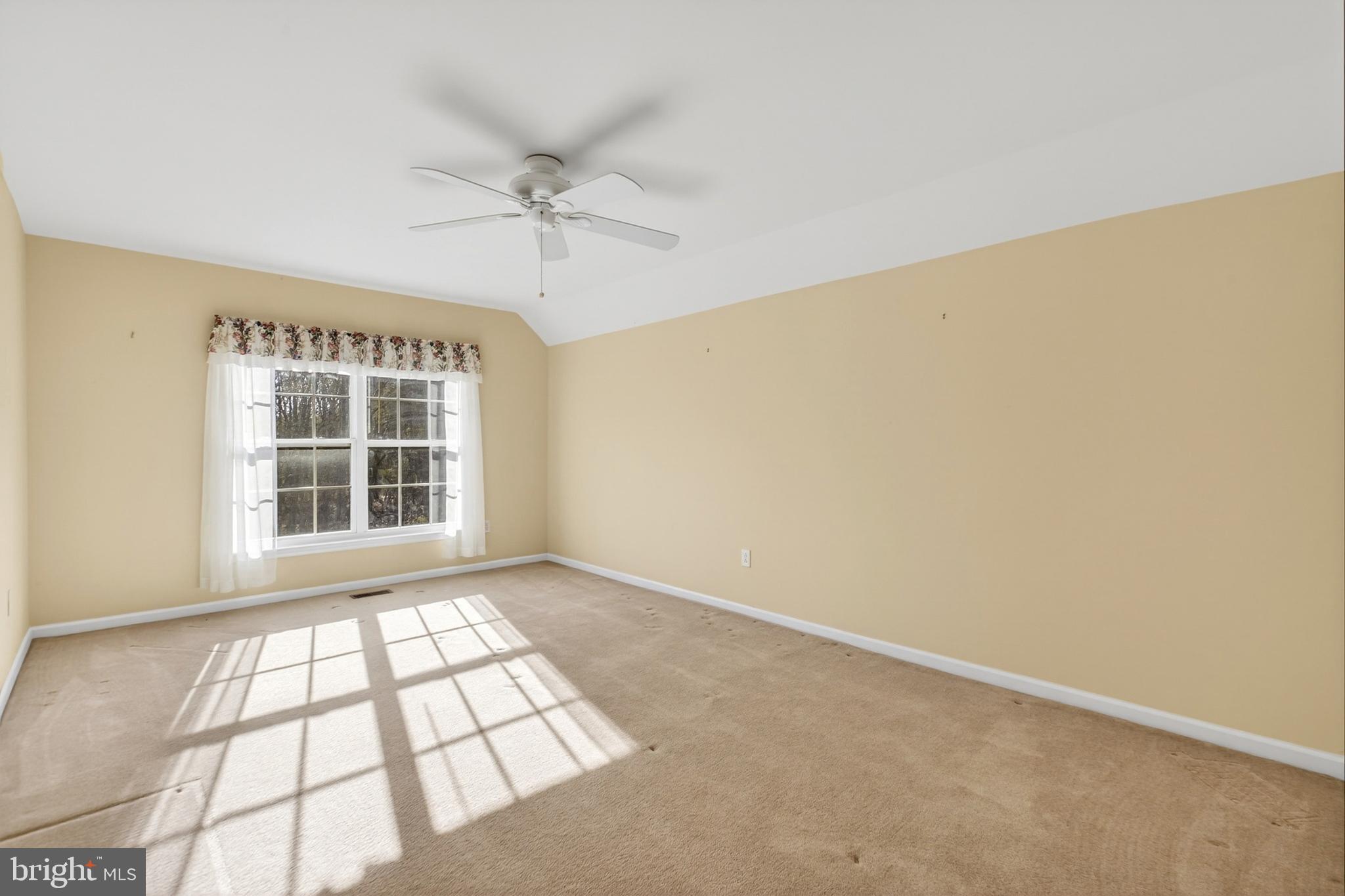 88 Springmill Drive Middletown, DE 19709 - Photo 32 of 63 an empty room with windows and fan