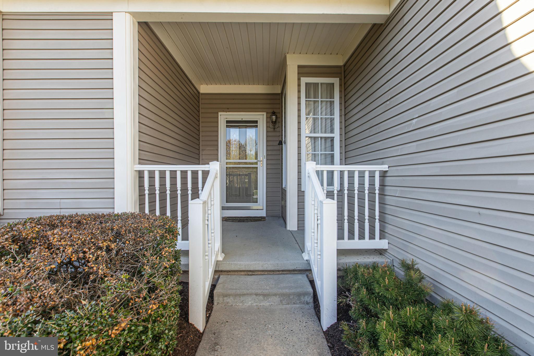 88 Springmill Drive Middletown, DE 19709 - Photo 4 of 63 a view of a house with a porch