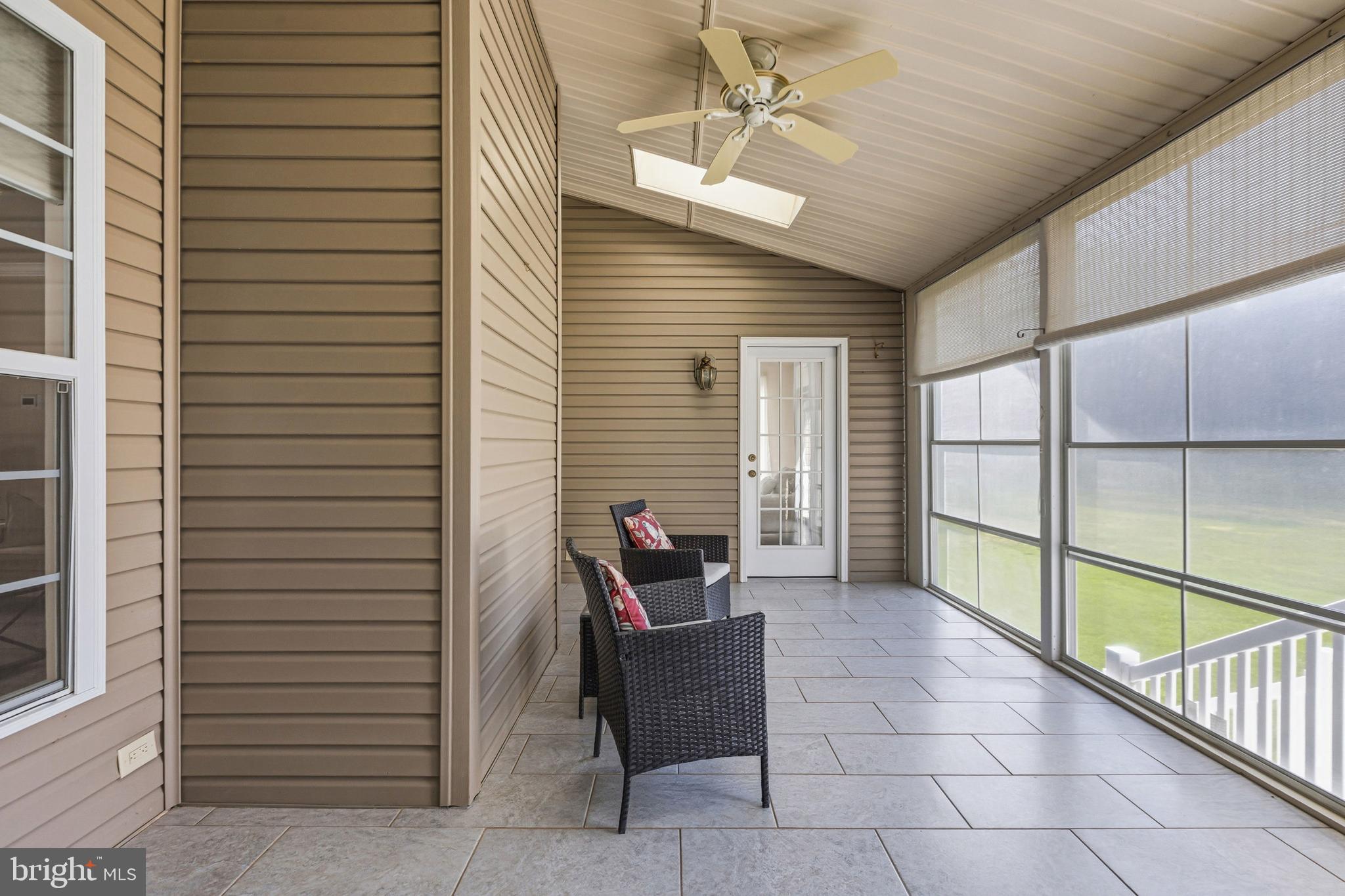 88 Springmill Drive Middletown, DE 19709 - Photo 50 of 63 a view of a patio with a table and chairs