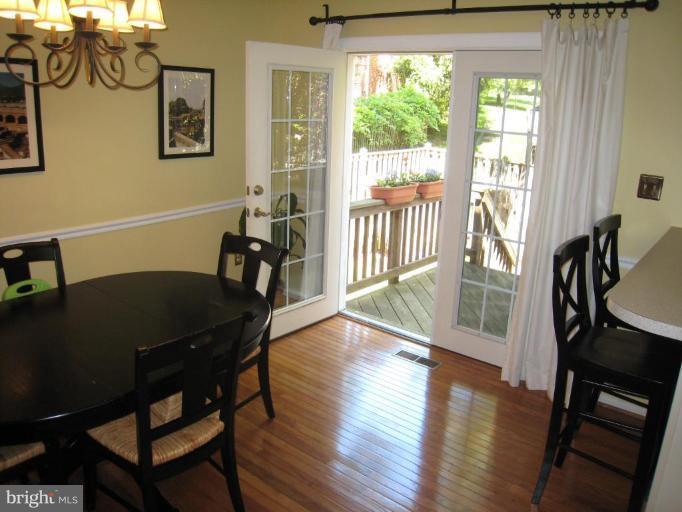 7424 Timberock Road Falls Church, VA 22043 - Photo 16 of 30 Family room with French doors leading to the deck