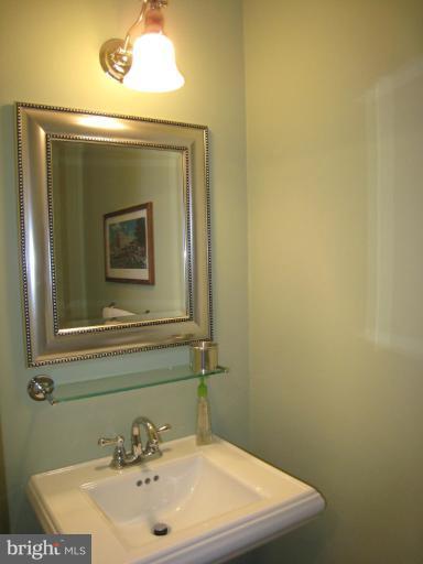 7424 Timberock Road Falls Church, VA 22043 - Photo 17 of 30 Stylish powder room with pedestal sink