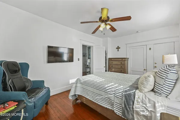 a bedroom with furniture and a table