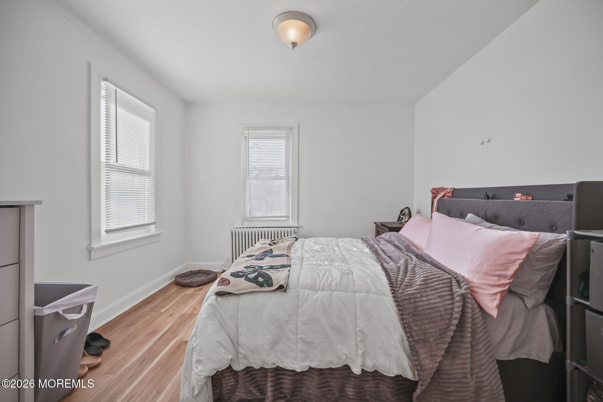 68 Main Street Matawan, NJ 07747 - Photo 26 of 33 a bedroom with a bed and window