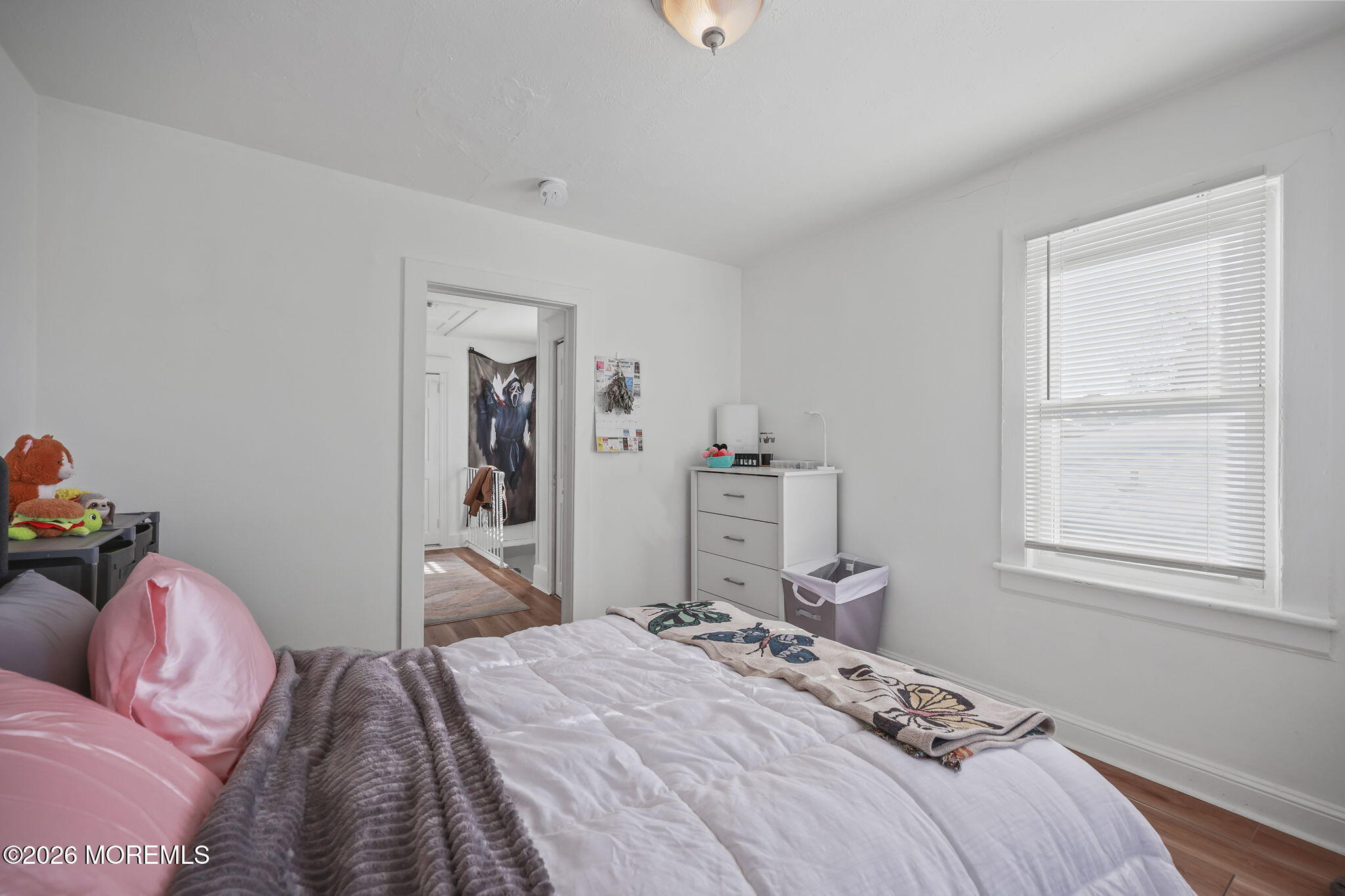 68 Main Street Matawan, NJ 07747 - Photo 27 of 33 a bedroom with a bed and a window