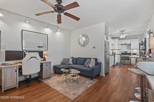 a kitchen with stainless steel appliances granite countertop a stove and a sink
