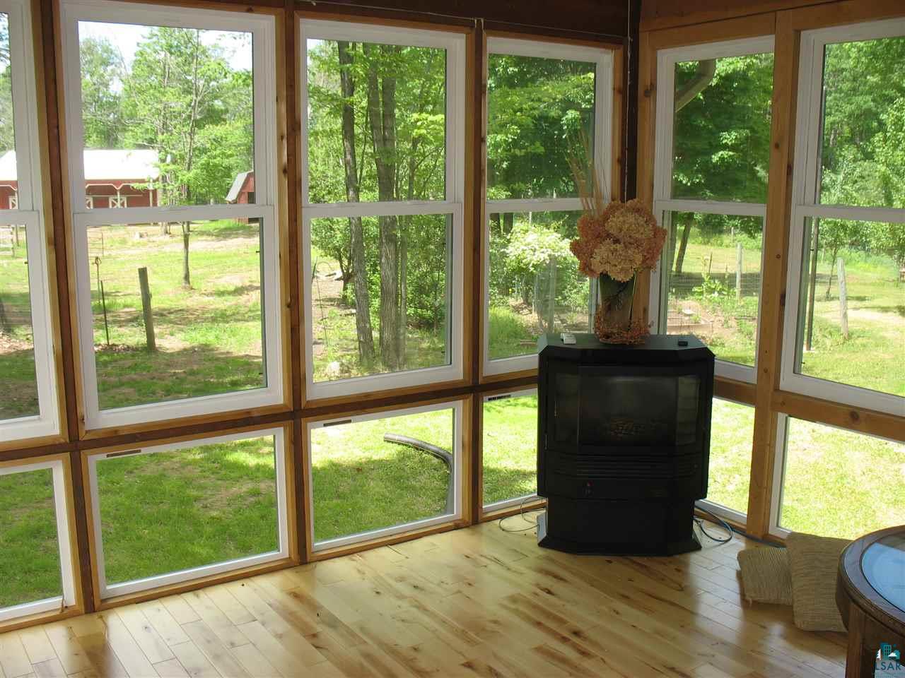 1645 Ridgeview Drive Carlton, MN 55718 - Photo 9 of 35 main floor glass porch