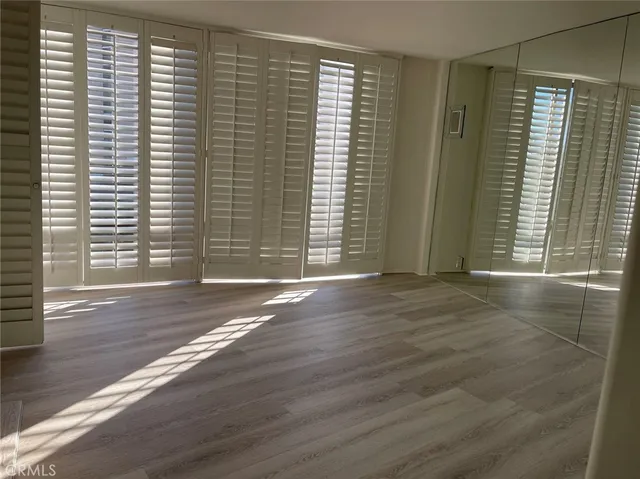 a view of livingroom with hardwood floor and window