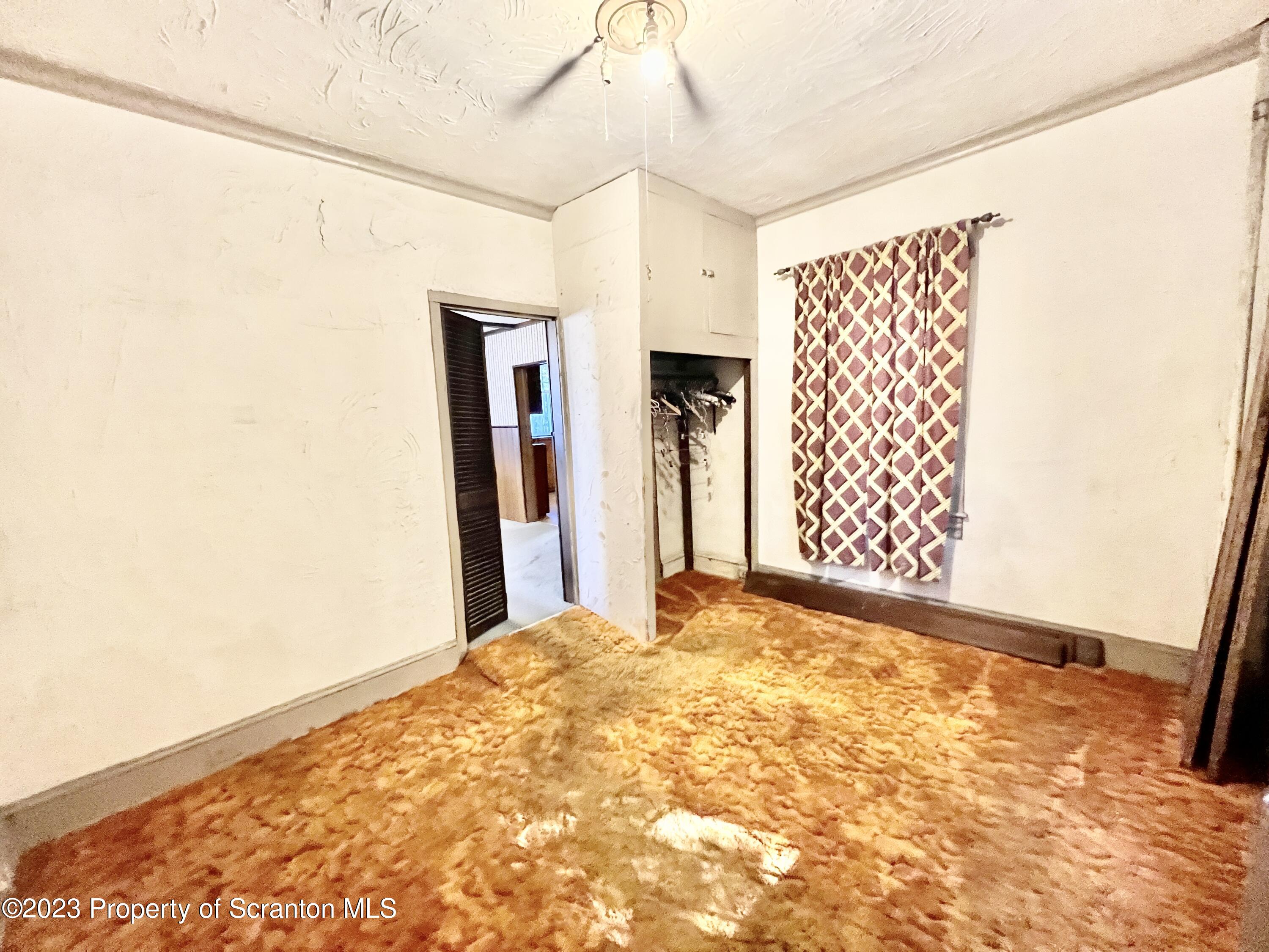 959 Constitution Avenue Jessup, PA 18434 - Photo 11 of 27 a view of a big room with closet and windows