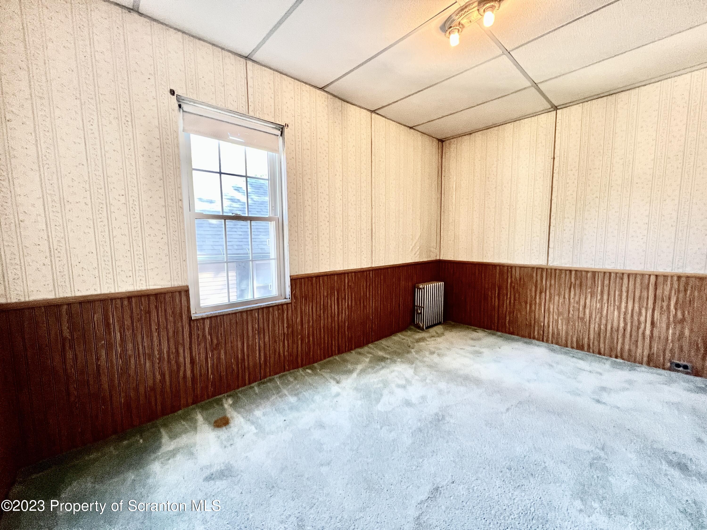 959 Constitution Avenue Jessup, PA 18434 - Photo 12 of 27 a view of an empty room with a window