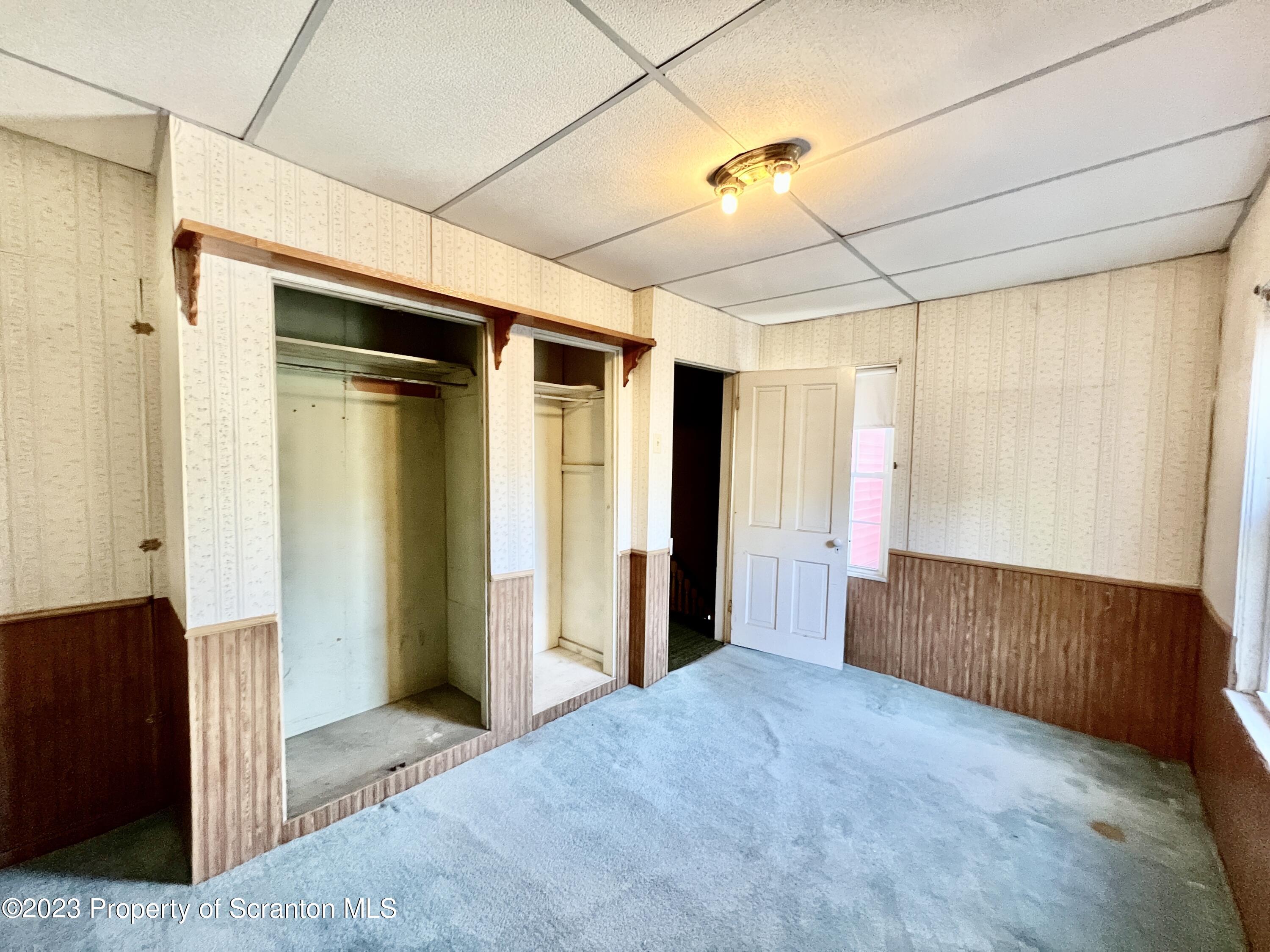 959 Constitution Avenue Jessup, PA 18434 - Photo 13 of 27 a view of entryway with wooden walls