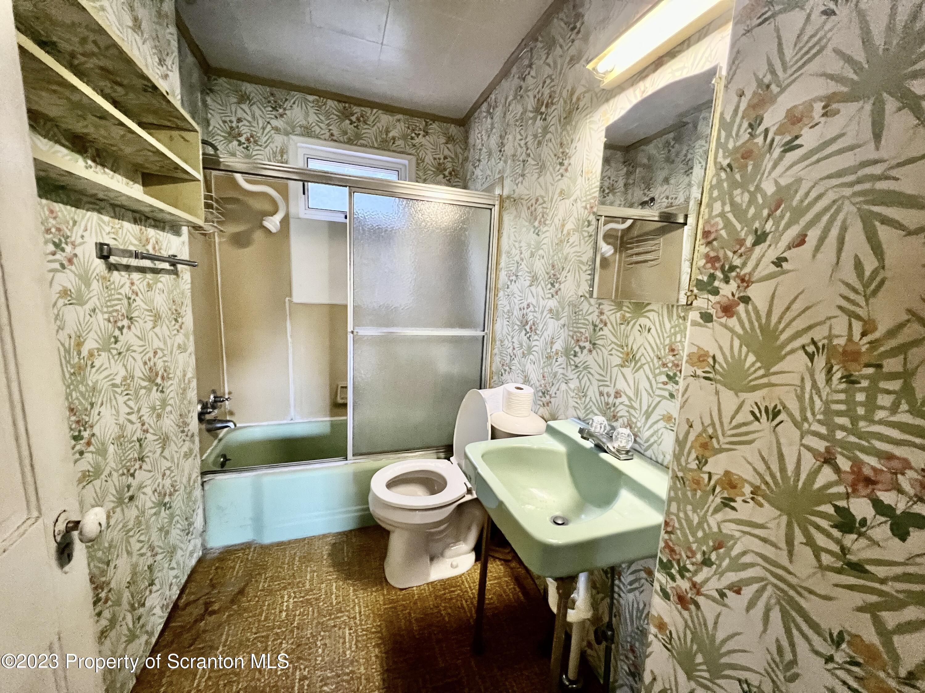 959 Constitution Avenue Jessup, PA 18434 - Photo 18 of 27 a bathroom with a sink toilet and shower