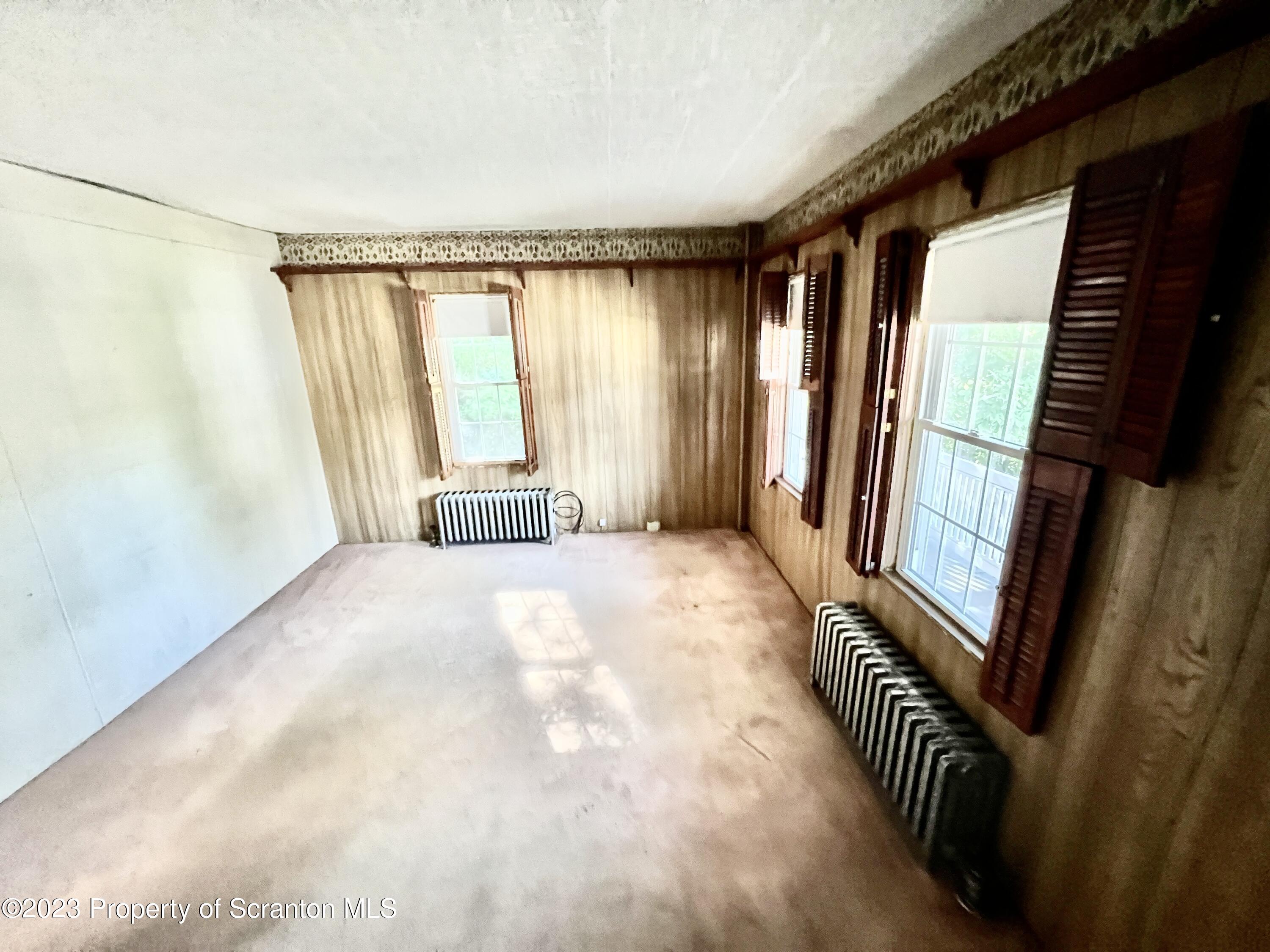 959 Constitution Avenue Jessup, PA 18434 - Photo 3 of 27 a view of an empty room with a window
