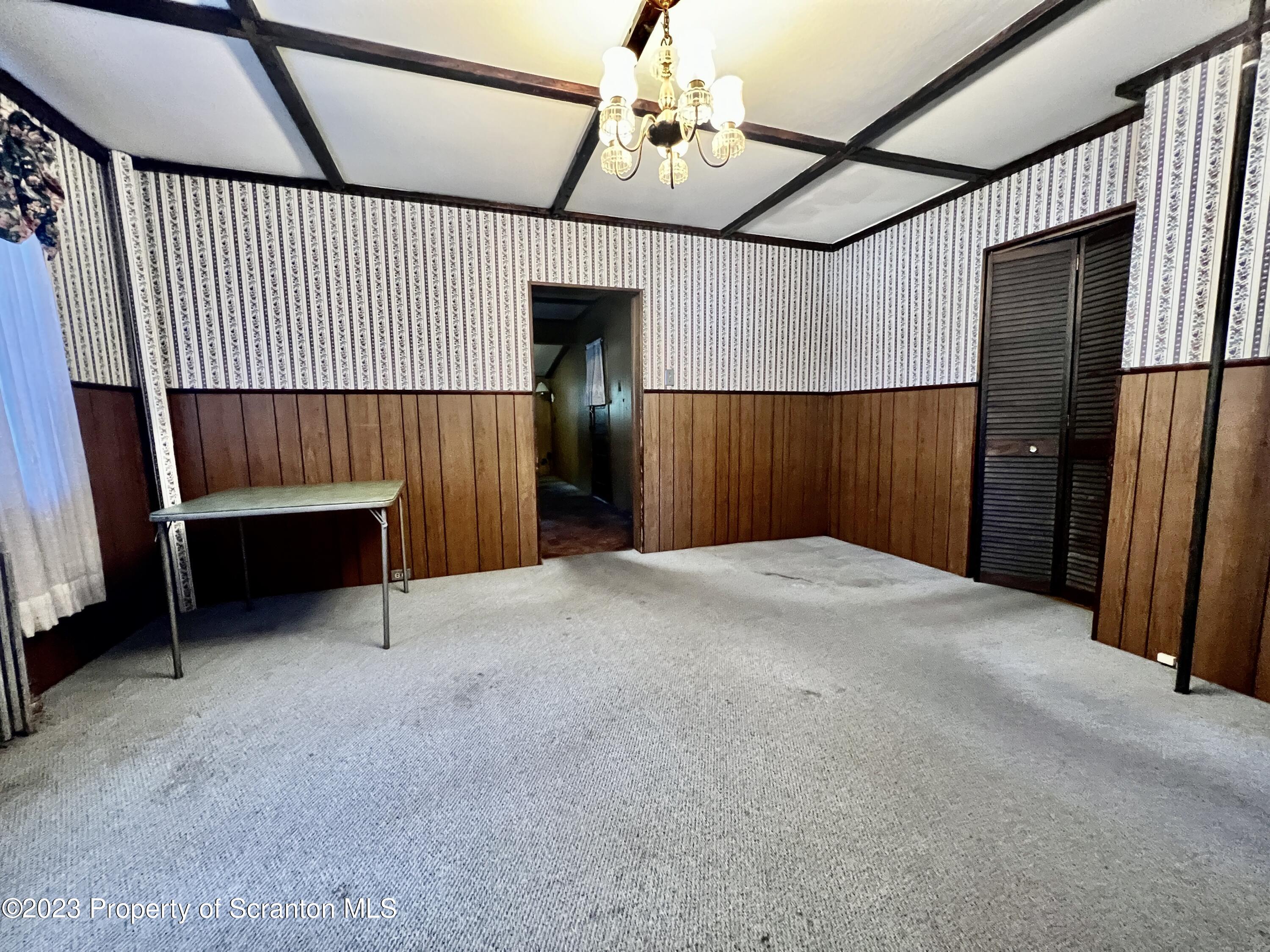 959 Constitution Avenue Jessup, PA 18434 - Photo 5 of 27 a view of entryway with wooden walls