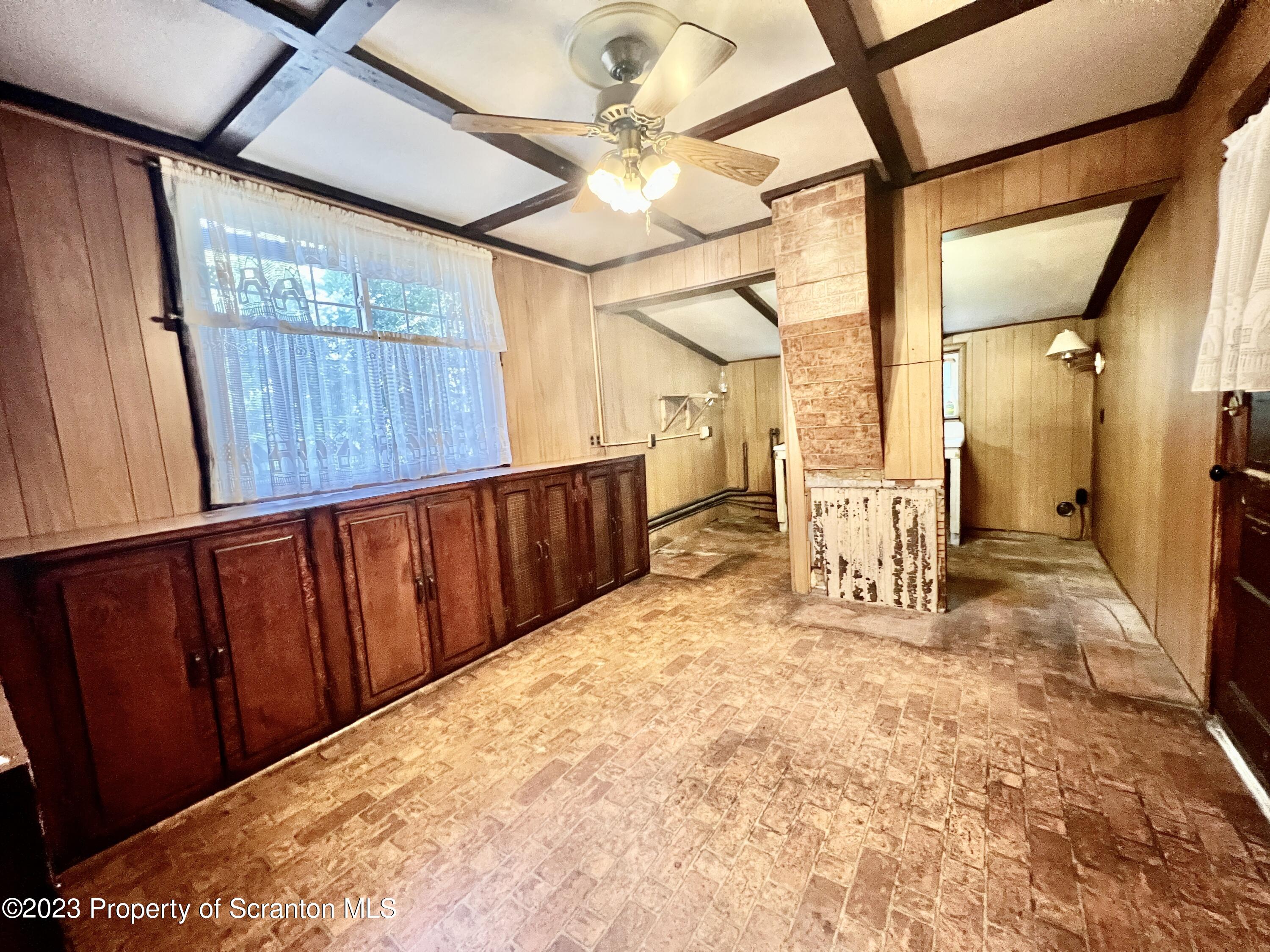 959 Constitution Avenue Jessup, PA 18434 - Photo 6 of 27 a view of a porch with wooden floor