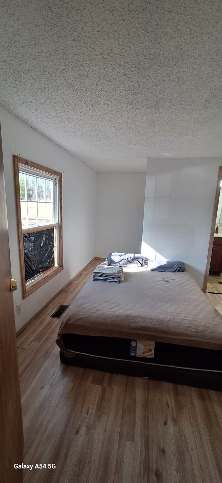 342 East Little Richland Road Waverly, TN 37185 - Photo 7 of 17 a bedroom with a bed and a window