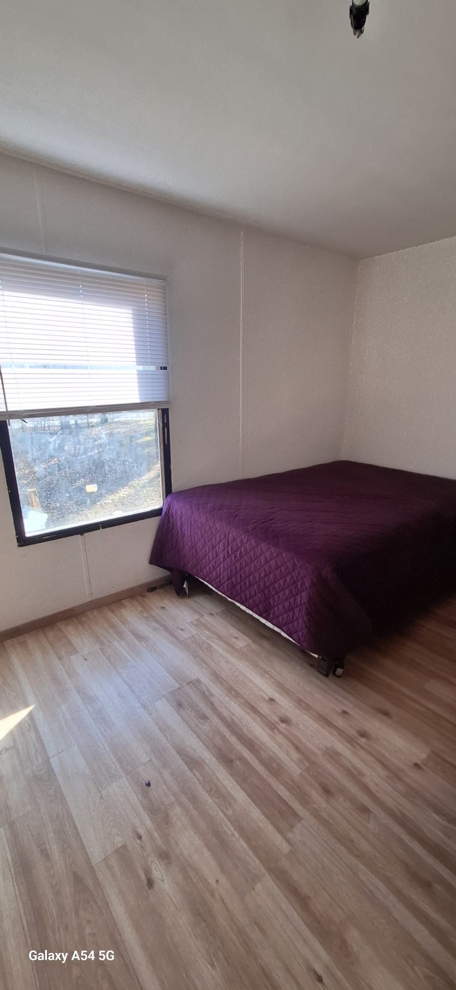 342 East Little Richland Road Waverly, TN 37185 - Photo 8 of 17 a view of wooden floor and windows in a room
