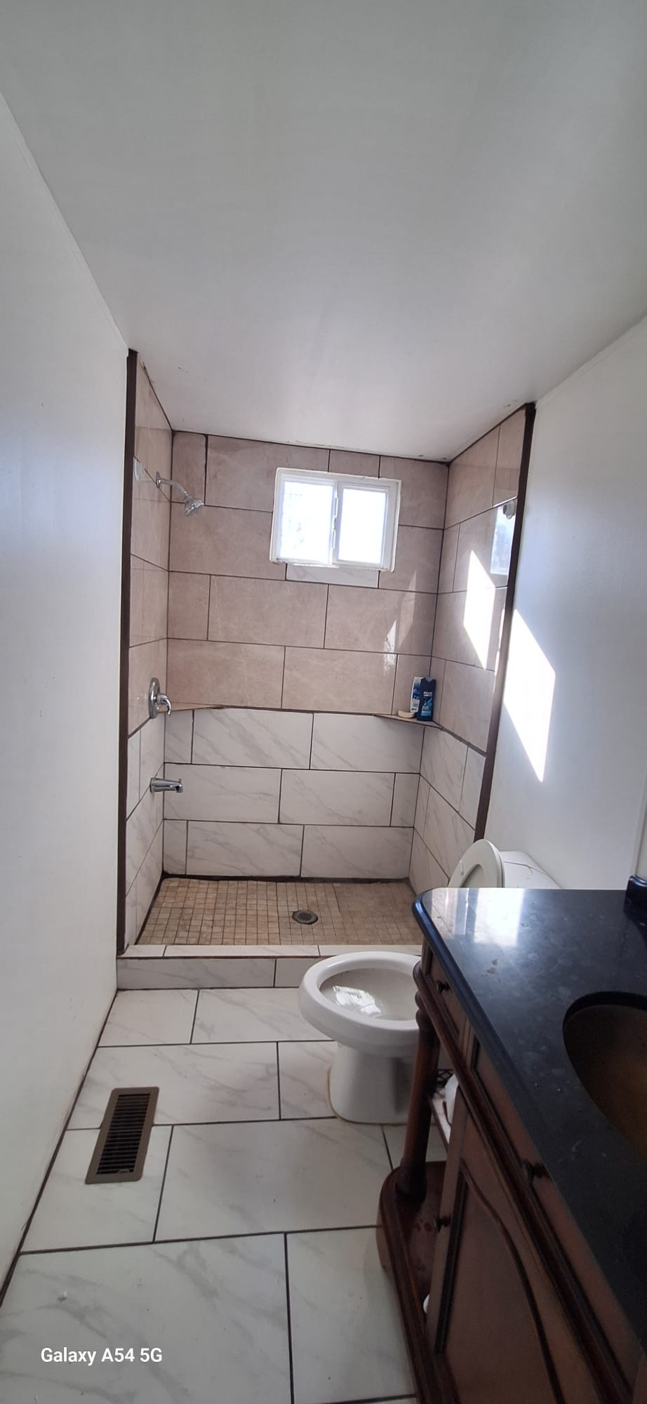 342 East Little Richland Road Waverly, TN 37185 - Photo 9 of 17 a bathroom with a bathtub and shower