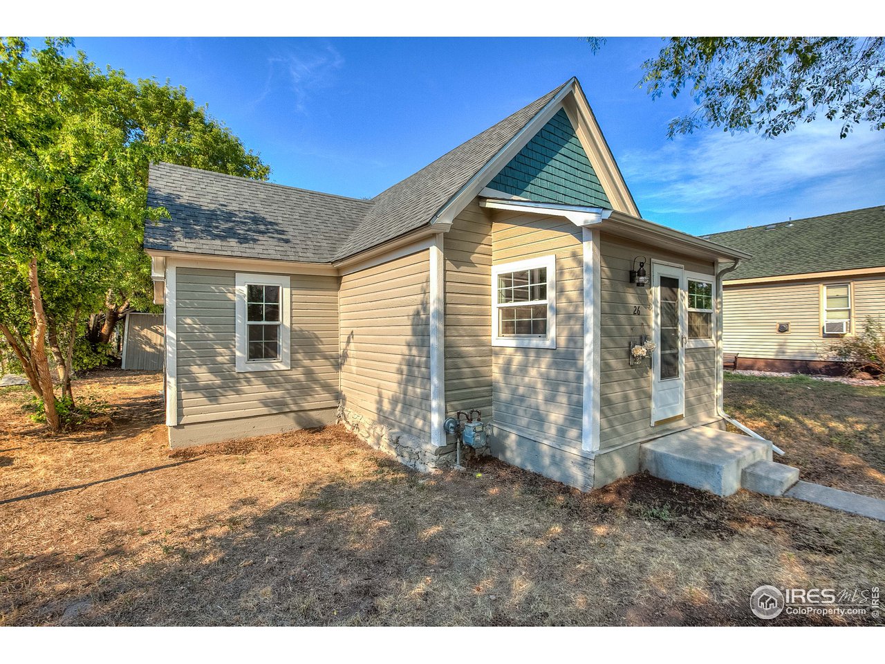 26 Main Street Windsor, CO 80550 - Photo 1 of 22 a view of outdoor space and yard
