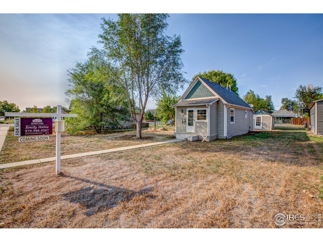 26 Main Street Windsor, CO 80550 - Photo 3 of 22 a view of outdoor space and yard