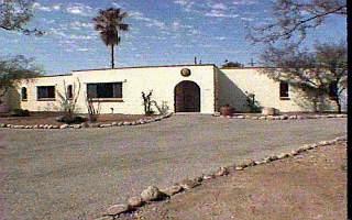 8100 East Cloud Road Tucson, AZ 85750 - Photo 1 of 1 a view of a house with a patio