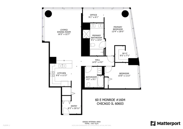 a living room with furniture a rug kitchen view and a large window