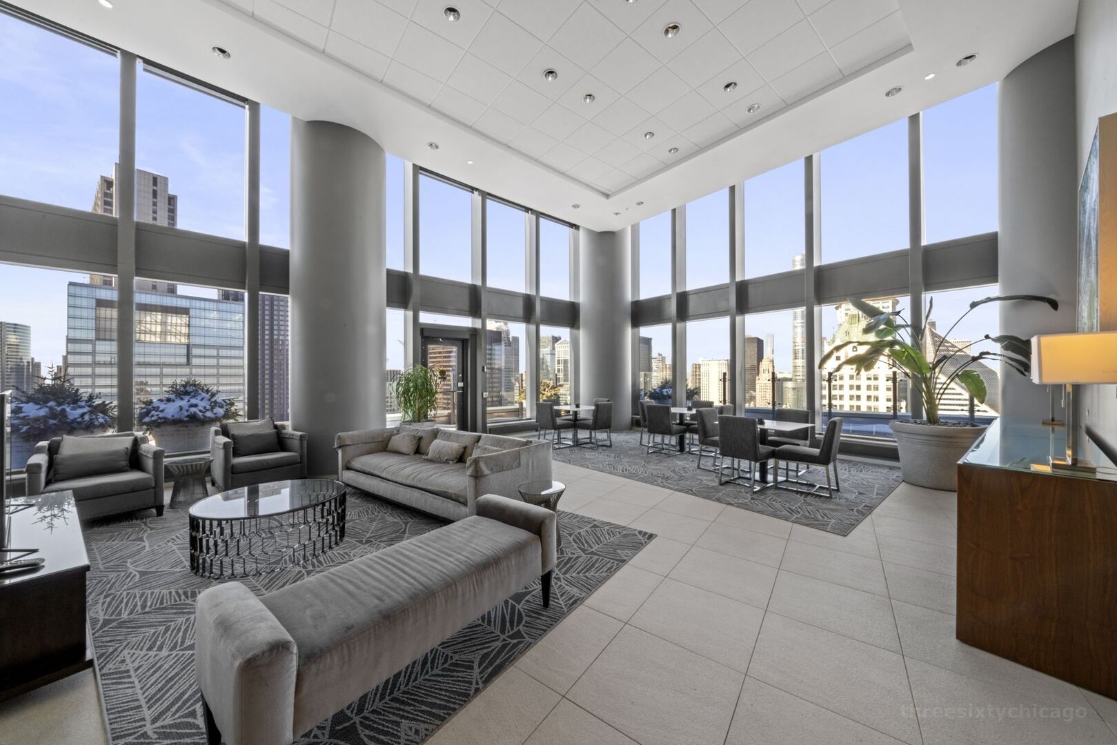 60 East Monroe Street, Unit 1604 Chicago, IL 60603 - Photo 27 of 34 a living room with furniture and a large window