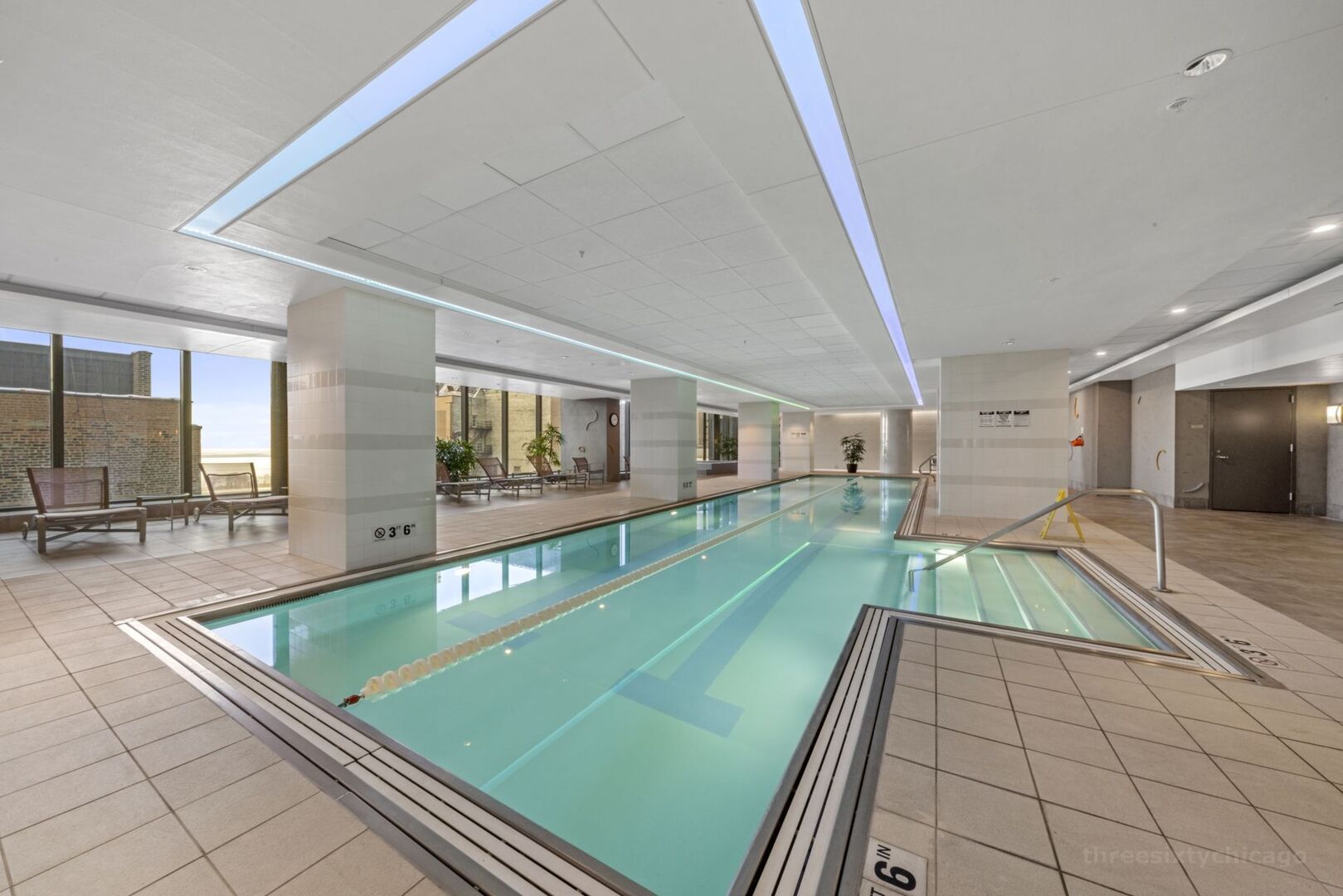 60 East Monroe Street, Unit 1604 Chicago, IL 60603 - Photo 31 of 34 a room with pool table and a large window