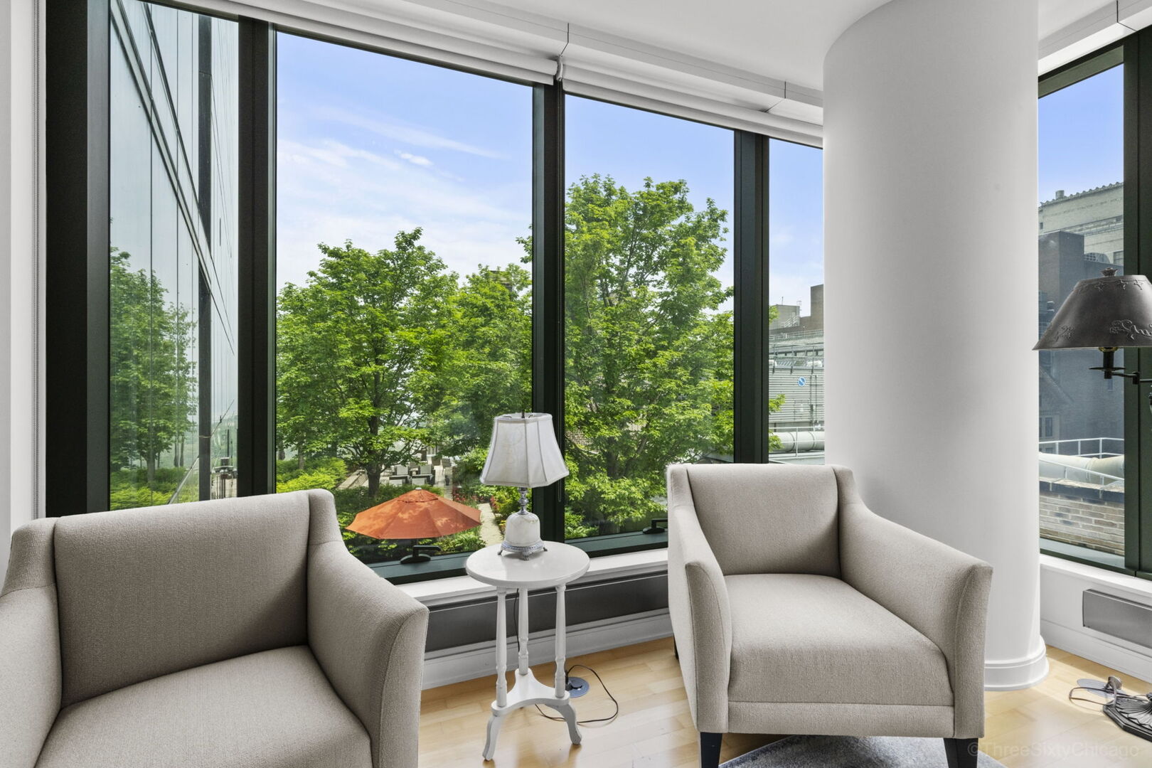 60 East Monroe Street, Unit 1604 Chicago, IL 60603 - Photo 6 of 34 a balcony with furniture and a potted plant