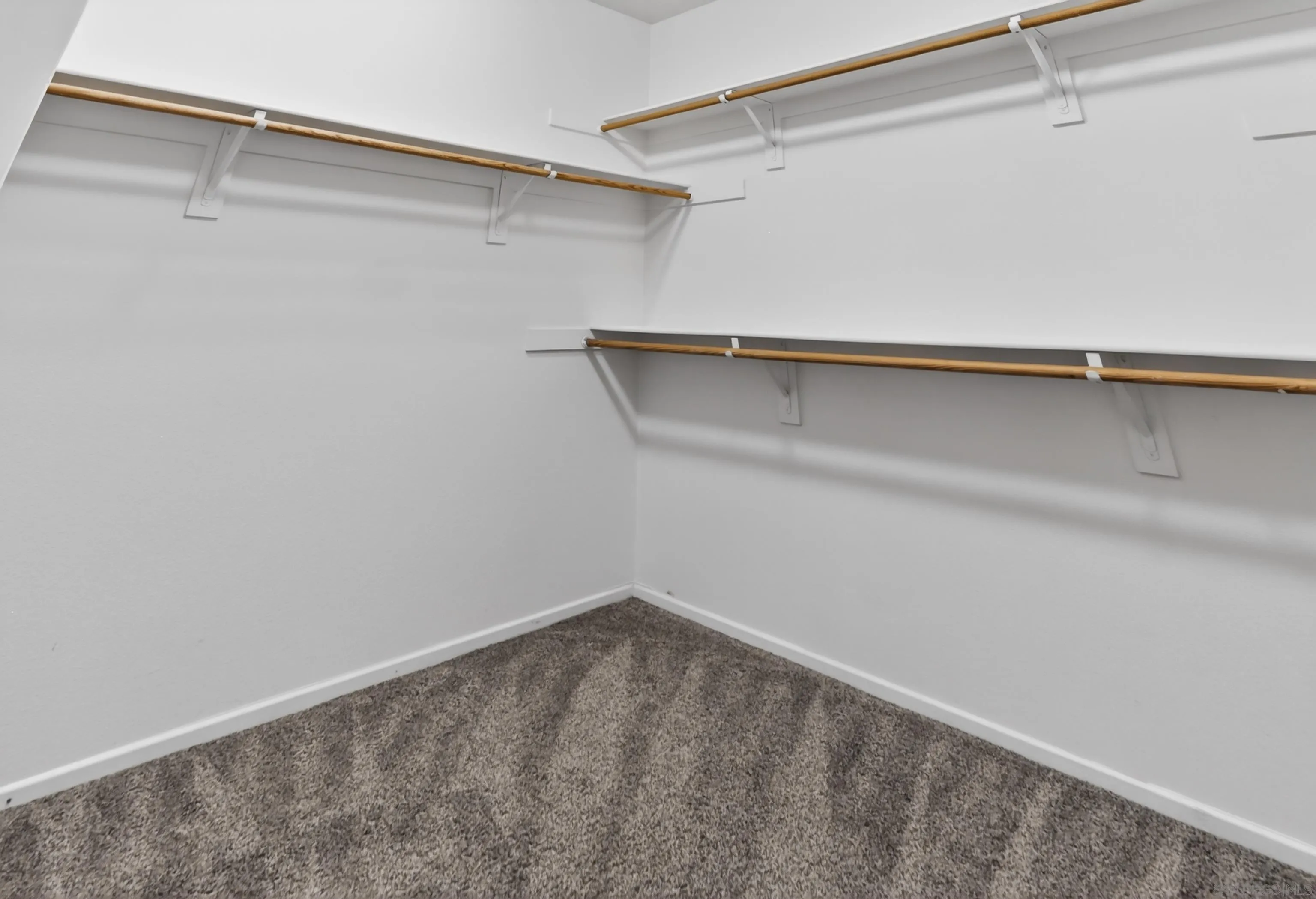 1432 Belmont Park Road Oceanside, CA 92057 - Photo 48 of 54 a view of an empty walk in closet