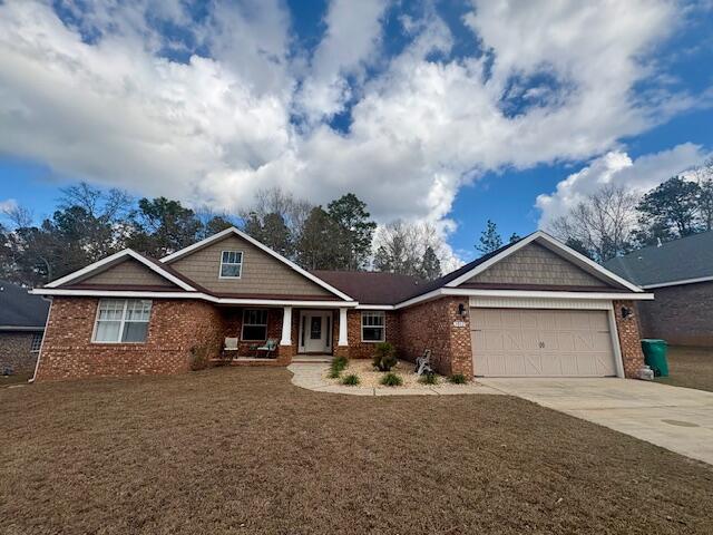 3012 Crown Creek Circle Crestview, FL 32539 - Photo 1 of 22 a front view of a house with garden