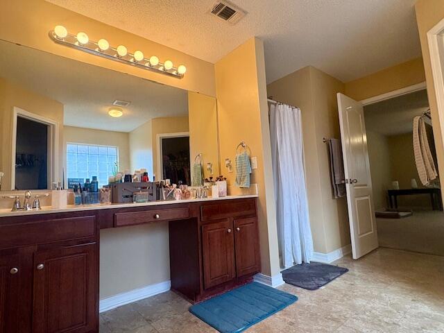 3012 Crown Creek Circle Crestview, FL 32539 - Photo 12 of 22 a kitchen with a sink and refrigerator