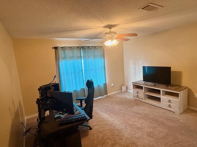 3012 Crown Creek Circle Crestview, FL 32539 - Photo 16 of 22 a view of a livingroom with furniture and a flat screen tv